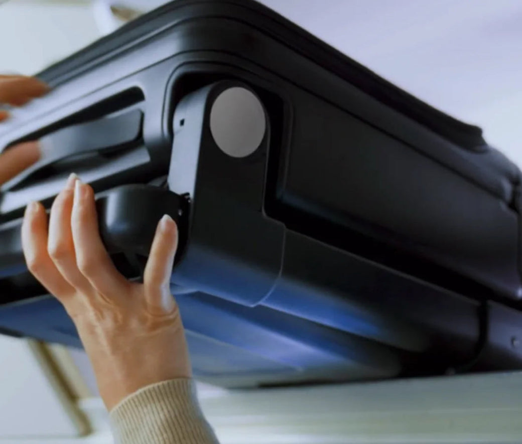 The TernX Carry-On stowed in an aircraft overhead bin
