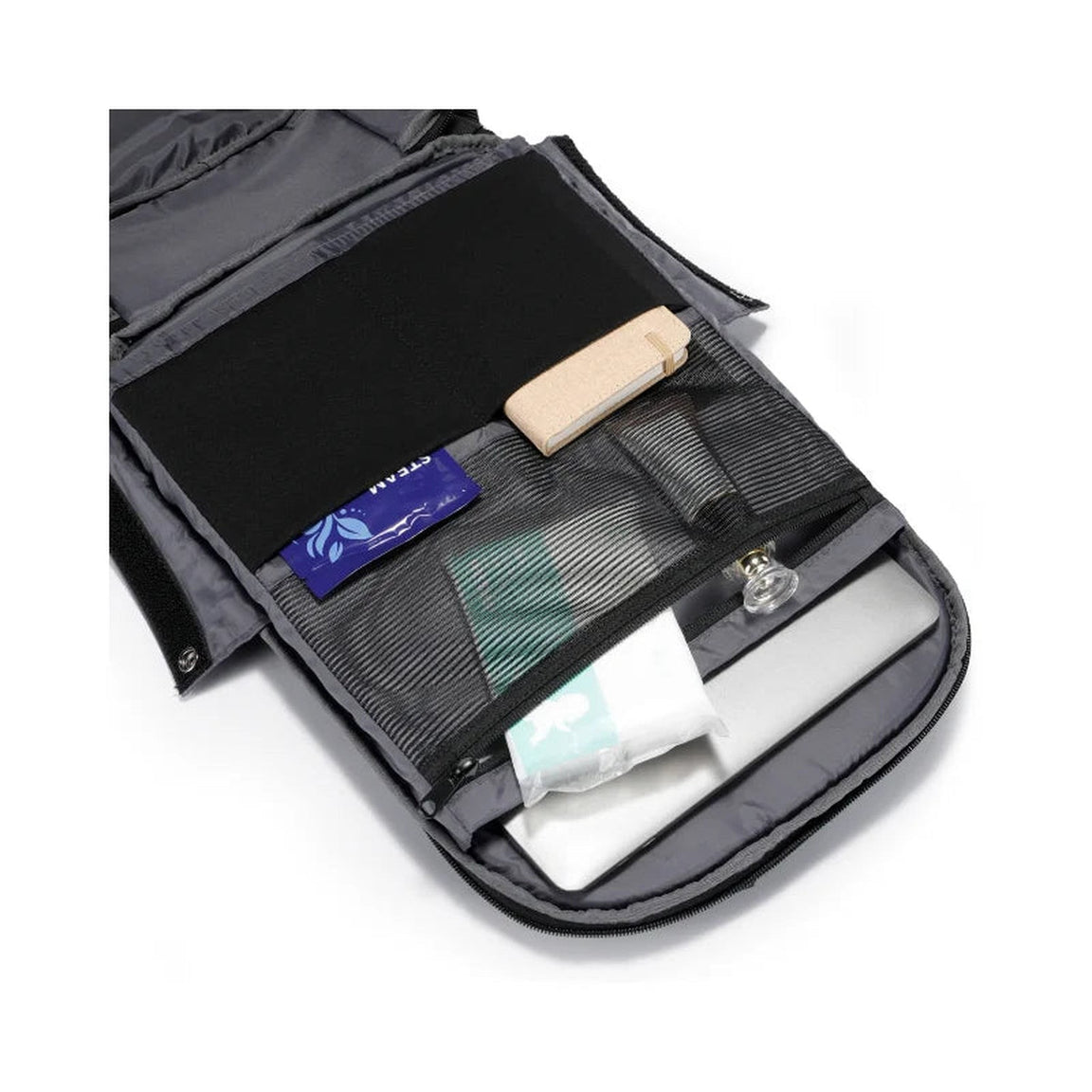 Quick-access front flap pocket of the TernX diaper bag backpack