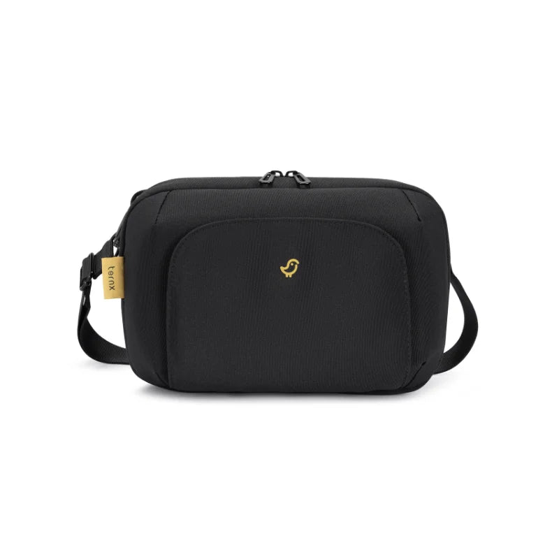 Compact TernX Sling Bag for travel essentials. Highlights convenient organization and hands-free use.